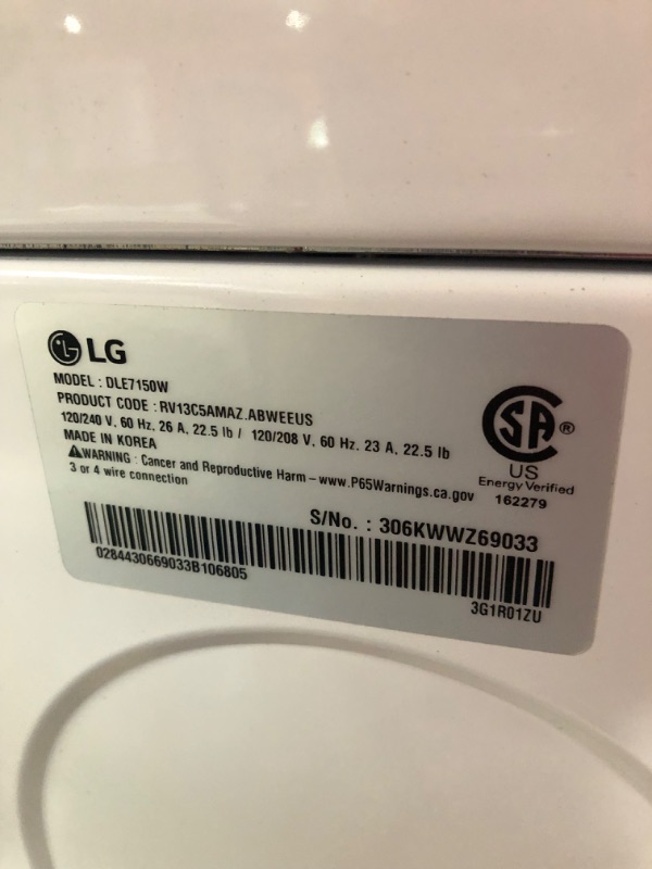 Photo 15 of *MINOR DAMAGE SEE NOTES-MISSING POWER ADAPTERS*
7.3 cu. ft. Ultra Large Capacity Electric Dryer with Sensor Dry Technology MODEL #: DLE7150W SERIAL #: 306KWWZ69033