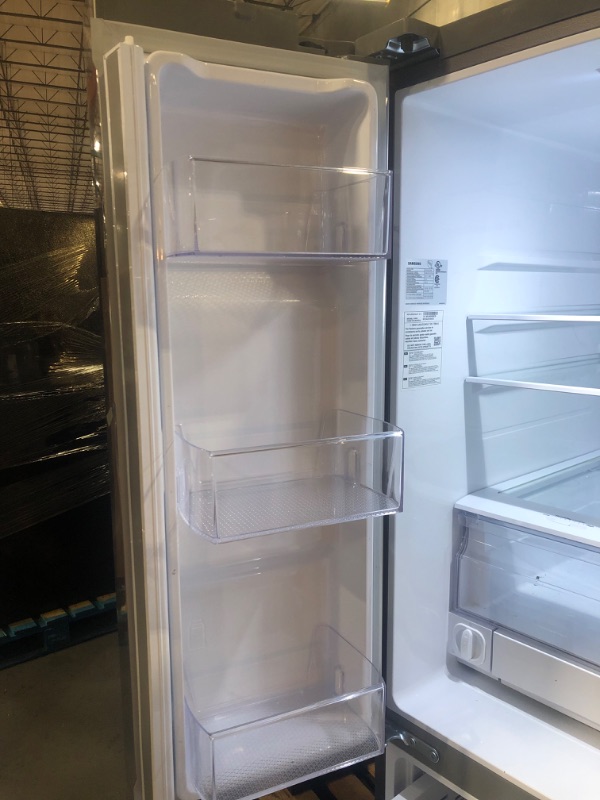 Photo 4 of *PREV USED-MINOR DENTS SEE NOTES*
22 cu. ft. Smart 3-Door French Door Refrigerator with External Water Dispenser in Fingerprint Resistant Stainless Steel MODEL #: RF22A4221SR SERIAL #: 0BA34BBW500879D