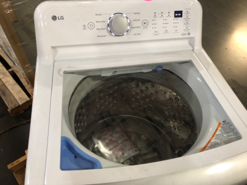 Photo 4 of 5.0 cu. ft. Mega Capacity Top Load Washer with TurboDrum™ Technology MODEL #: WT7150CW SERIAL #: 308TNHM09513