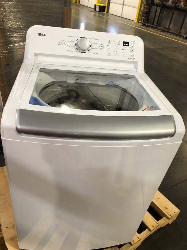 Photo 2 of 5.0 cu. ft. Mega Capacity Top Load Washer with TurboDrum™ Technology MODEL #: WT7150CW SERIAL #: 308TNHM09513