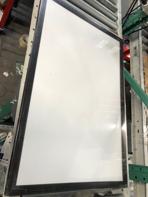 Photo 1 of Amazon Basics Magnetic Dry Erase White Board, 35 x 23-Inch Whiteboard - Black Wooden Frame 23"x35" Magnetic, Wood Frame