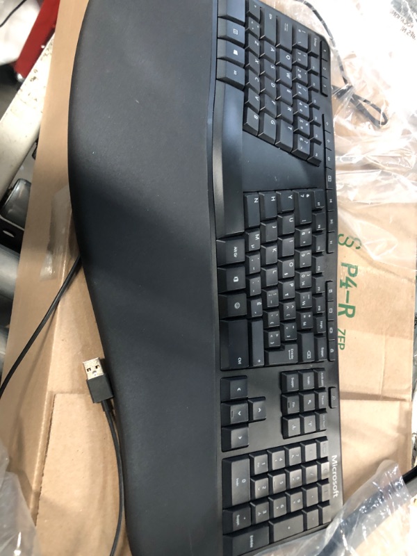 Photo 3 of Microsoft Ergonomic Keyboard - Black. Wired, Comfortable, Ergonomic Keyboard with Cushioned Wrist and Palm Support. Split Keyboard. Dedicated Office Key.