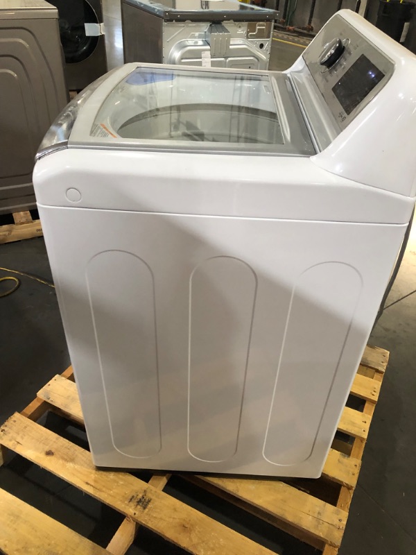 Photo 11 of 5.5 cu.ft. Mega Capacity Smart wi-fi Enabled Top Load Washer with TurboWash3D™ Technology and Allergiene™ Cycle MODEL #: WT7900HWA SERIAL #: 304TNLE2Q712