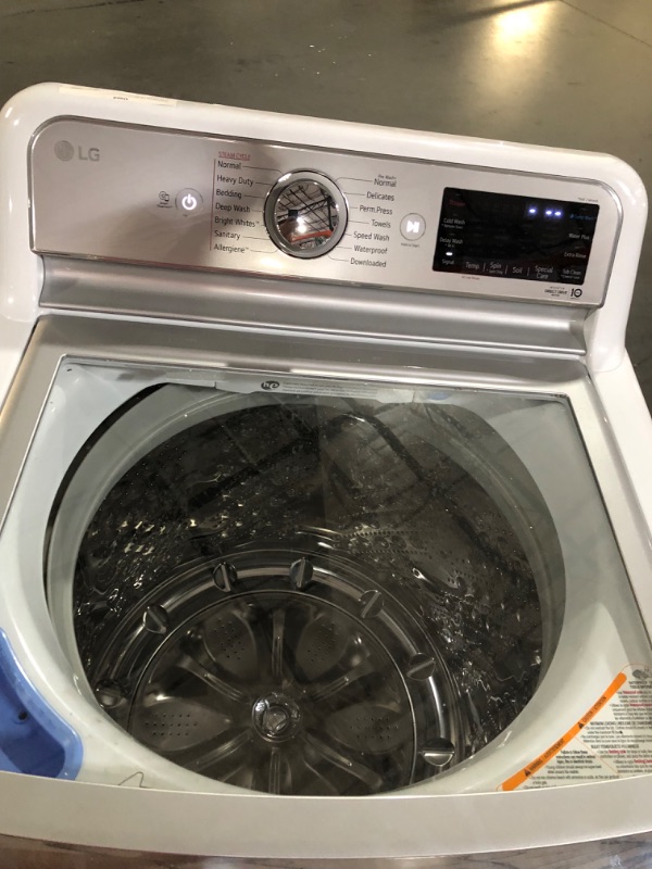 Photo 4 of 5.5 cu.ft. Mega Capacity Smart wi-fi Enabled Top Load Washer with TurboWash3D™ Technology and Allergiene™ Cycle MODEL #: WT7900HWA SERIAL #: 304TNLE2Q712