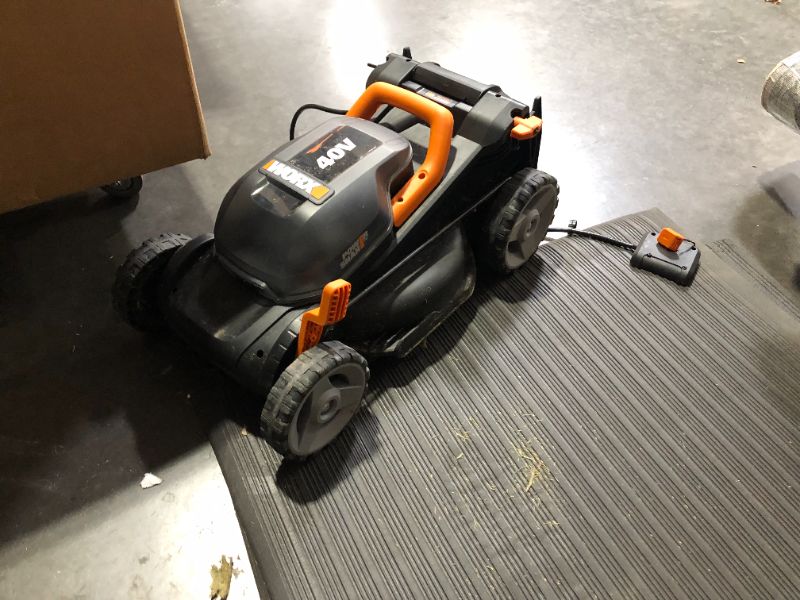 Photo 2 of ***HEAVILY USED AND DIRTY - NONFUNCTIONAL - SEE NOTES***
Worx WG779 40V Power Share 4.0Ah 14" Cordless Lawn Mower