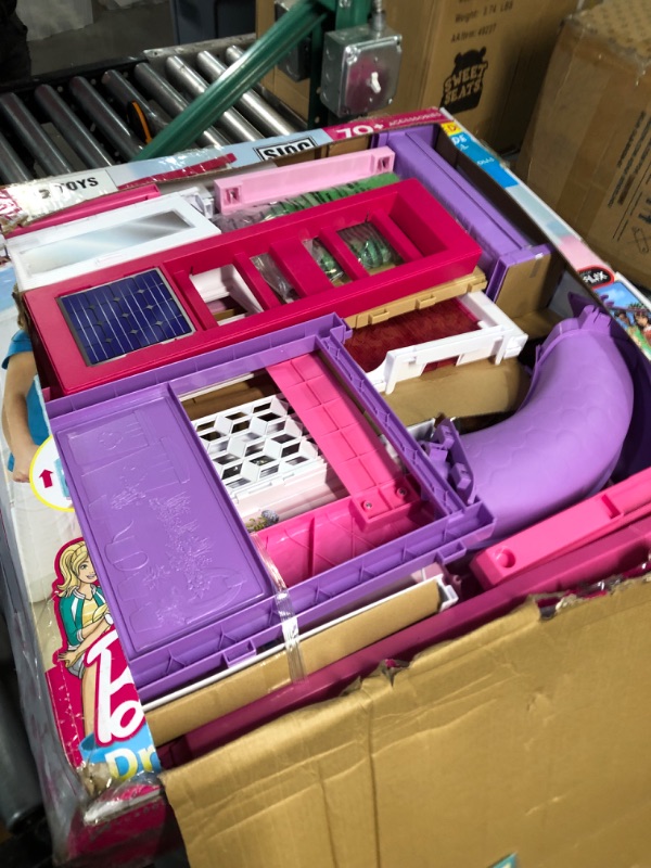 Photo 1 of Barbie Dreamhouse, Doll House Playset with 70+ Accessories Including Transforming Furniture, Elevator, Slide, Lights & Sounds Wheelchair Accessible Elevator