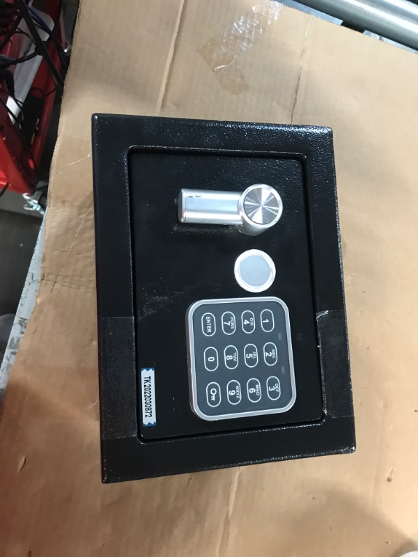 Photo 1 of **Keypad is dead, Key is locked inside.**
Safe lock box