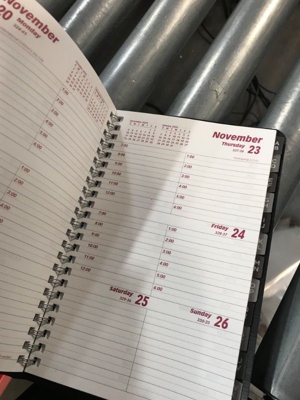 Photo 4 of Brownline 2023 Essential Weekly Planner, January to December,  Black, 8" x 5" 