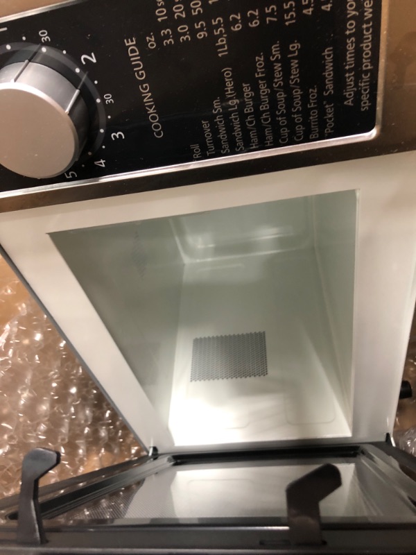 Photo 3 of **MINOR DAMAGE**   Panasonic NE-1025F Compact Light-Duty Countertop Commercial Microwave Oven with 6-Minute Electronic Dial Control Timer, Bottom Energy Feed, 1000W, 0.8 Cu. Ft. Capacity Silver