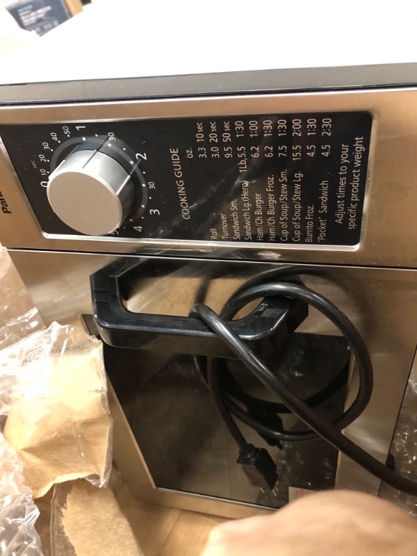 Photo 2 of **MINOR DAMAGE**   Panasonic NE-1025F Compact Light-Duty Countertop Commercial Microwave Oven with 6-Minute Electronic Dial Control Timer, Bottom Energy Feed, 1000W, 0.8 Cu. Ft. Capacity Silver