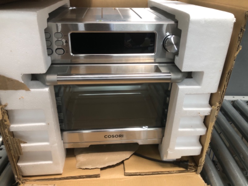 Photo 1 of COSORI Air Fryer Toaster Oven Combo, 12-in-1 Convection Ovens Countertop, Stainless Steel, Smart, 6-Slice Toast, 12-inch Pizza, with Bake, Roast, Broil, 75 Recipes&Accessories Tray, Basket, 26.4QT 25L+Air fryer stainless steel