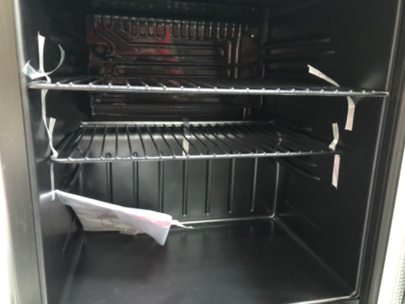 Photo 3 of DENTED  EDGE Frigidaire 70 Can Beverage Refrigerator, (EFMIS164-CU) Black