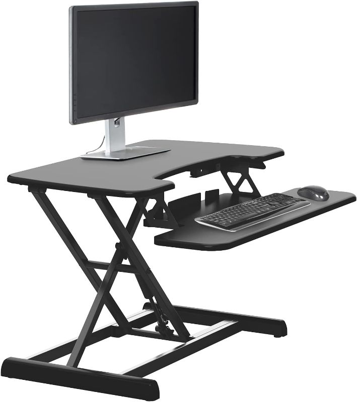 Photo 1 of Vari - VariDesk Essential Vertical Lift 30 - Compact Two-Tier Standing Desk Converter for Monitor & Accessories - Height Adjustable Sit Stand Desk - Home Office Monitor Riser - 30" Wide, Black
