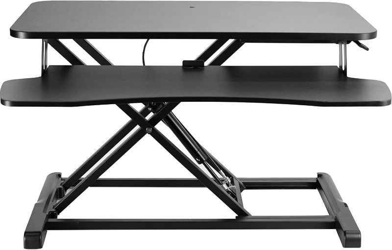 Photo 1 of *SIMILAR TO STOCK PHOTO* 32 inch Desk Converter, K Series, Height Adjustable Sit to Stand Riser, Dual Monitor and Laptop Workstation with Wide Keyboard Tray, Black, DESK-V000K
