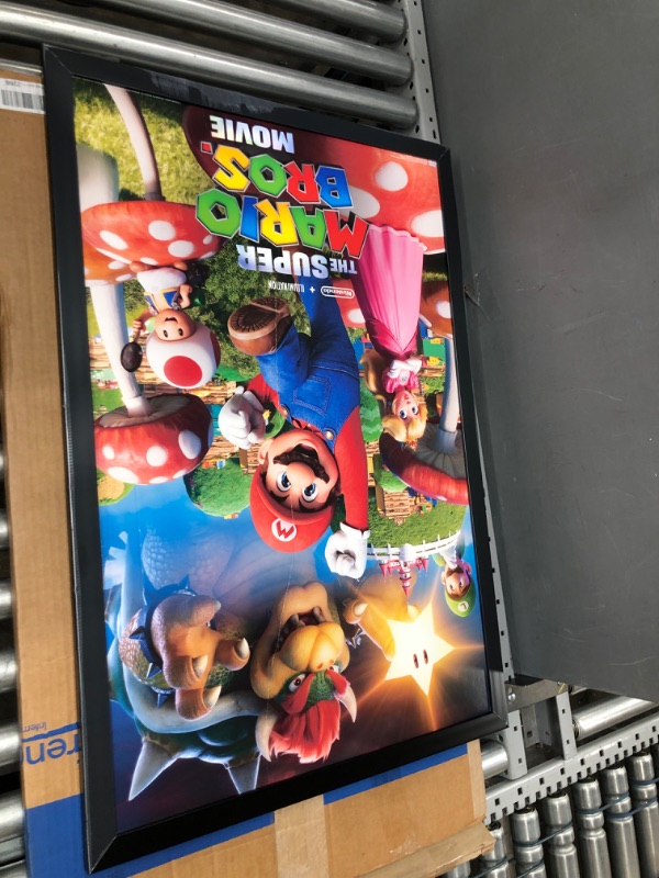 Photo 2 of *DAMAGED* Trends International The Super Mario Bros. Movie - Mushroom Kingdom Key Art Wall Poster, 22.375" x 34", Black Framed Version
