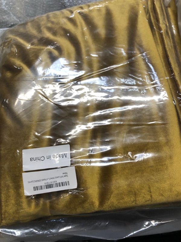 Photo 1 of Cherry Home Super Soft Luxury Heavy Velvet Set of 2 Warm Yellow Blackout Energy Efficient Grommet Curtain Panel Drapes Ginger Mustard Curtain Panels, 52 in x 84 in (W x L)
