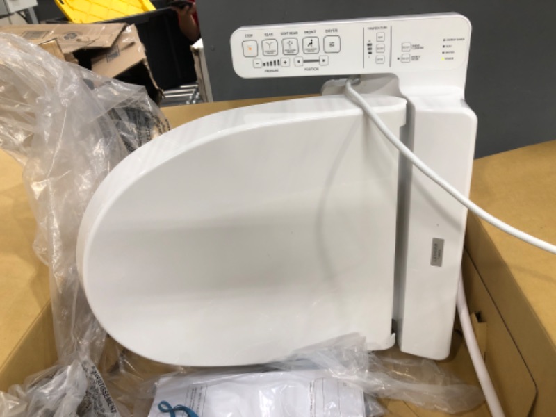 Photo 5 of **POWER LIGHT FLASHES WHEN ON** TOTO SW2033R#01 C100 Electronic Bidet Toilet Cleansing Water, Heated Seat, Deodorizer, Warm Air Dryer, and PREMIST, Round, Cotton White
