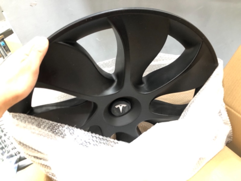 Photo 2 of **DIRTY AND EMBLEMS ARE FALLING OFF**
XINFOOB Tesla Model Y Wheel 19-Inch Hub Cap Replacement ABS Cover Set of 4 Matte Black 2020-2023 Model Y Accessories 19" matte black style 1