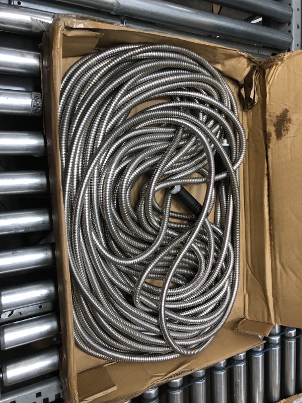 Photo 2 of Morvat Heavy Duty 150 Foot Stainless Steel Garden Hose Set with All Brass Shut-Off Valve, Kink & Tangle Free, Crush & Puncture Resistant, Includes: Spray Nozzle, Hose Hanger, Teflon Tape & Washers
