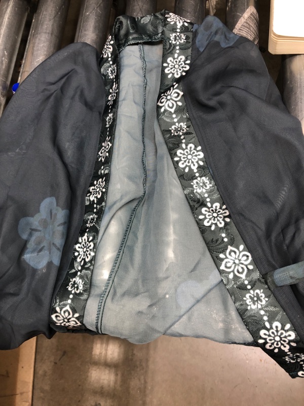 Photo 1 of 2 small shirts 