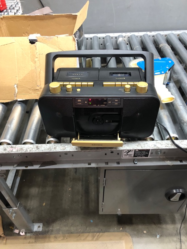 Photo 3 of Jensen MCR-1500 Gold Modern Retro Music System Portable CD/MP3 Cassette Player Stereo Boombox, LCD Display, Compact Dual Cassette Deck Recorder, AM/FM Radio, Bass Boost + Aux in & Headphone Jack