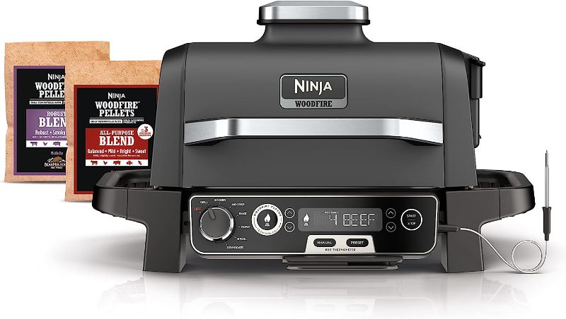 Photo 1 of Ninja OG701 Woodfire Outdoor Grill & Smoker, 7-in-1 Master Grill, BBQ Smoker, & Air Fryer plus Bake, Roast, Dehydrate, & Broil, uses Ninja Woodfire Pellets, Weather-Resistant, Portable, Electric, Grey
