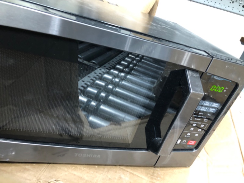 Photo 5 of *POWERS ON**TOSHIBA EM925A5A-BS Countertop Microwave Oven, 0.9 Cu Ft With 10.6 Inch Removable Turntable, 900W, 6 Auto Menus, Mute Function & ECO Mode, Child Lock, LED Lighting, Black Stainless Steel