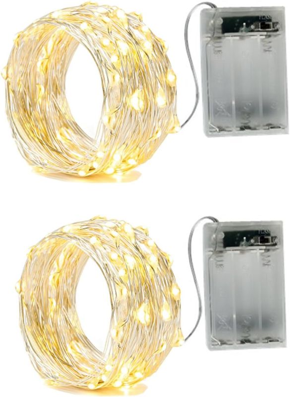 Photo 1 of BXROIU 2 x 20LEDs Fairy Lights Battery Operated, Silver Wire 2 Mode Chains String Lights for Bedroom Christmas Party Decoration (Warm White, 6.6)
