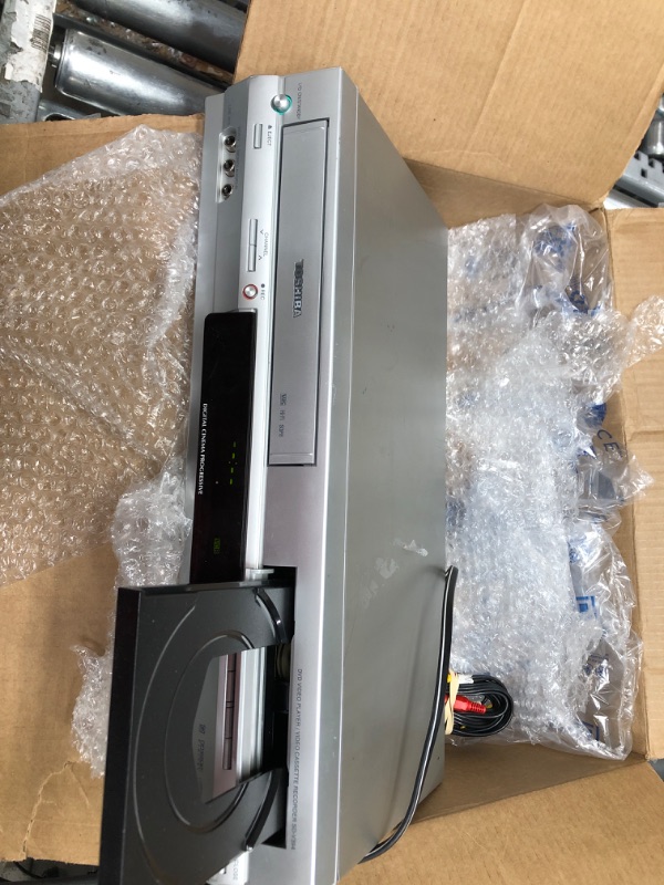 Photo 1 of VHS RECORDER AND DVD PLAYER