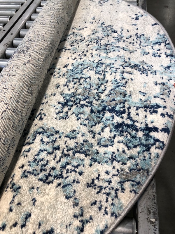 Photo 1 of Artistic Weavers Arti Modern Abstract Area Rug, 62" Dark Blue/Aqua
