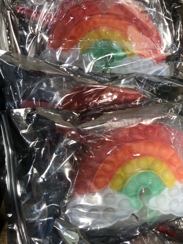 Photo 1 of *** BUNDLE OF 3 *** unicorn and rainbow pop fidget toys
