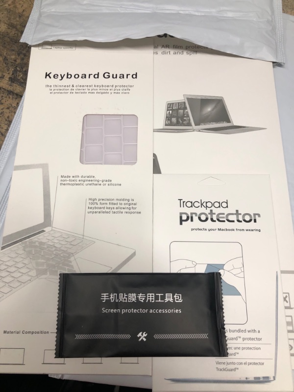 Photo 1 of 3 ITEMS SCREEN/KEYBOARD PROTECTOR BUNDLE