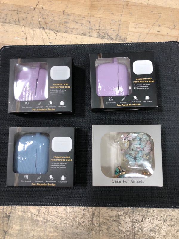 Photo 1 of BUNDLED OF 4 - Protective Case For Airpods Buds, 2 Pink, 1 Light Blue, and Clear Floral 