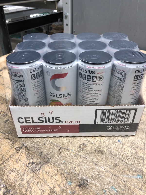 Photo 2 of (EXP: 01/24) CELSIUS Sparkling Mango Passionfruit, Functional Essential Energy Drink 12 Fl Oz (Pack of 12) Sparking Mango Passionfruit 12 Fl Oz (Pack of 12)