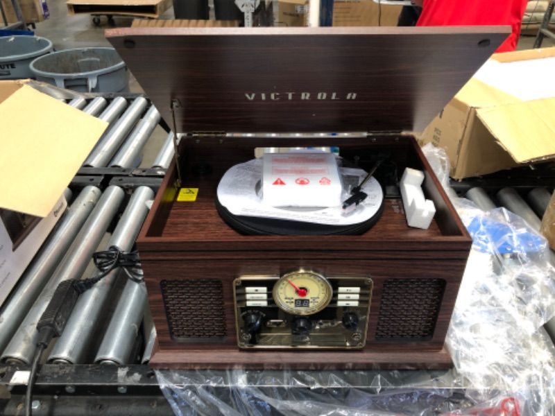 Photo 2 of **NEEDS REPAIR**
Victrola Nostalgic 6-in-1 Bluetooth Record Player & Multimedia Center with Built-in Speakers - 3-Speed Turntable, CD & Cassette Player, AM/FM Radio | Wireless Music Streaming | Espresso Espresso Entertainment Center