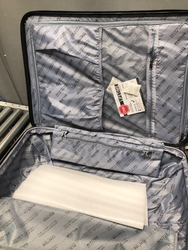 Photo 2 of Kenneth Cole REACTION Renegade 28” Check Size Expandable Luggage Lightweight Hardside 8-Wheel Spinner Travel Suitcase Bag, Navy Blue, inch Navy Blue 28-inch Checked