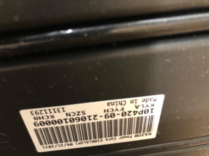 Photo 1 of Razor Power Core E100 Electric Scooter for Kids Ages 8+ - 100w Hub Motor, 8" Pneumatic Tire, Up to 11 mph and 60 min Ride Time, For Riders up to 120 lbs