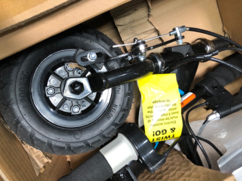 Photo 1 of Razor Power Core E100 Electric Scooter for Kids Ages 8+ - 100w Hub Motor, 8" Pneumatic Tire, Up to 11 mph and 60 min Ride Time, For Riders up to 120 lbs