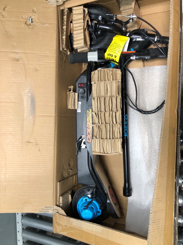 Photo 1 of Razor Power Core E100 Electric Scooter for Kids Ages 8+ - 100w Hub Motor, 8" Pneumatic Tire, Up to 11 mph and 60 min Ride Time, For Riders up to 120 lbs