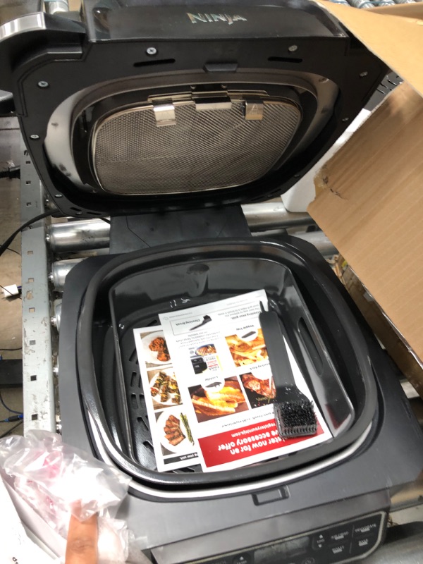 Photo 1 of ***NON-FUNCTIONAL*** Ninja AG301 Foodi 5-in-1 Indoor Grill with Air Fry, Roast, Bake & Dehydrate, Black/Silver Black/Silver 4-Quart Indoor Grill