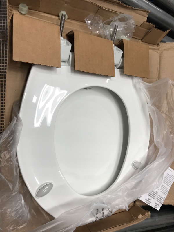 Photo 1 of BEMIS 790TDGSL 000 Heavy Duty Closed Front Plastic Toilet Seat with Cover will Slow Close, Never Loosen & Reduce Call-backs, ROUND, Plastic, White White Round Toilet Seat