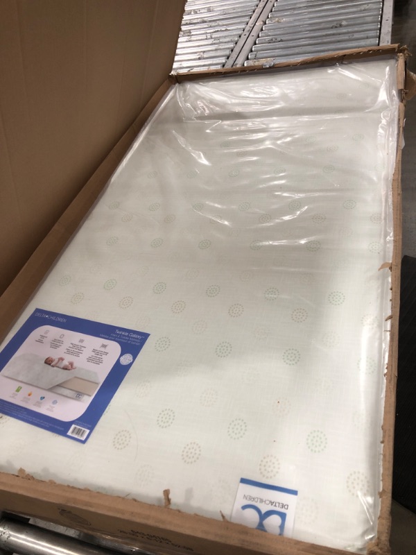 Photo 2 of Delta Children Twinkle Galaxy Dual Sided Crib and Toddler Mattress - Premium Sustainably Sourced Fiber Core - Waterproof - GREENGUARD Gold Certified (Non-Toxic) - 7 Year Warranty - Made in USA