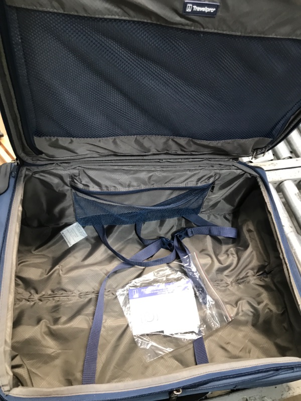 Photo 3 of **USED**  Travelpro Tourlite Softside Expandable Luggage with 4 Spinner Wheels, Lightweight Suitcase, Men and Women, Blue, Checked-Large 29-Inch
