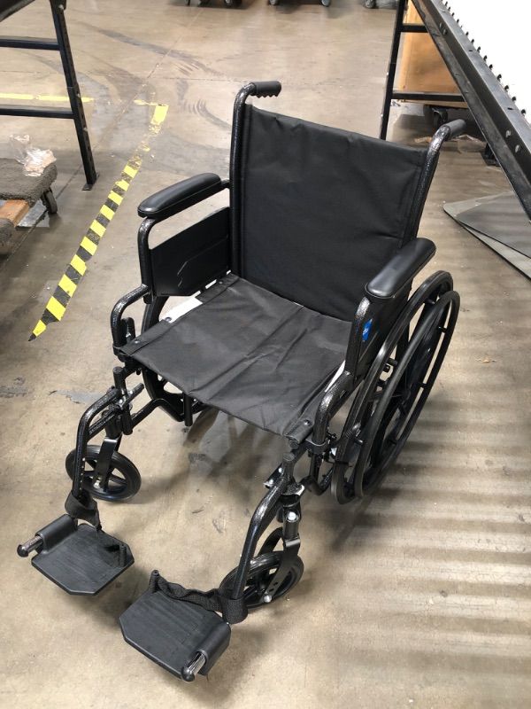 Photo 2 of **DAMAGED WHEEL**
Medline Wheelchair, Swing-Back Desk-Length Arms And Elevating Leg Rests, 18"