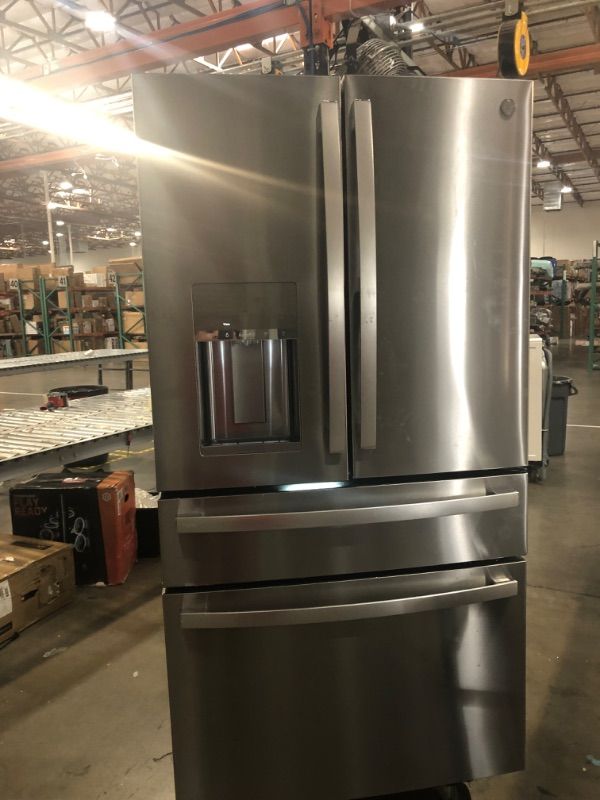 Photo 2 of ***PARTS ONLY***DOEN'T GET COLD, SOLD AS IS, NO REFUNDS, NO RETURNS.
GE Profile 27.9-cu ft 4-Door Smart French Door Refrigerator with Ice Maker and Door within Door (Fingerprint-resistant Stainless Steel) ENERGY STAR