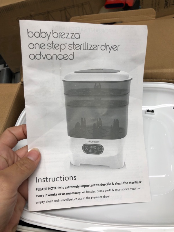 Photo 4 of Baby Brezza Bottle Sterilizer and Dryer Advanced – HEPA Filter And Steam Sterilization – Dries 33 Percent Faster Then Original - Universal Fit up to 8 Baby Bottles And 2 Sets of Pump Parts (Any Brand) Sterilizer-Dryer Advanced