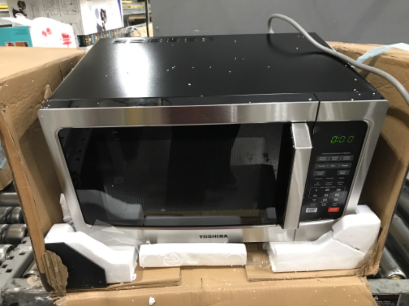 Photo 1 of TOSHIBA EM131A5C-SS Countertop Microwave Oven, 1.2 Cu Ft with 12.4" Turntable, Smart Humidity Sensor with 12 Auto Menus, Mute Function & ECO Mode, Easy Clean Interior, Stainless Steel & 1100W Silver Microwave Oven