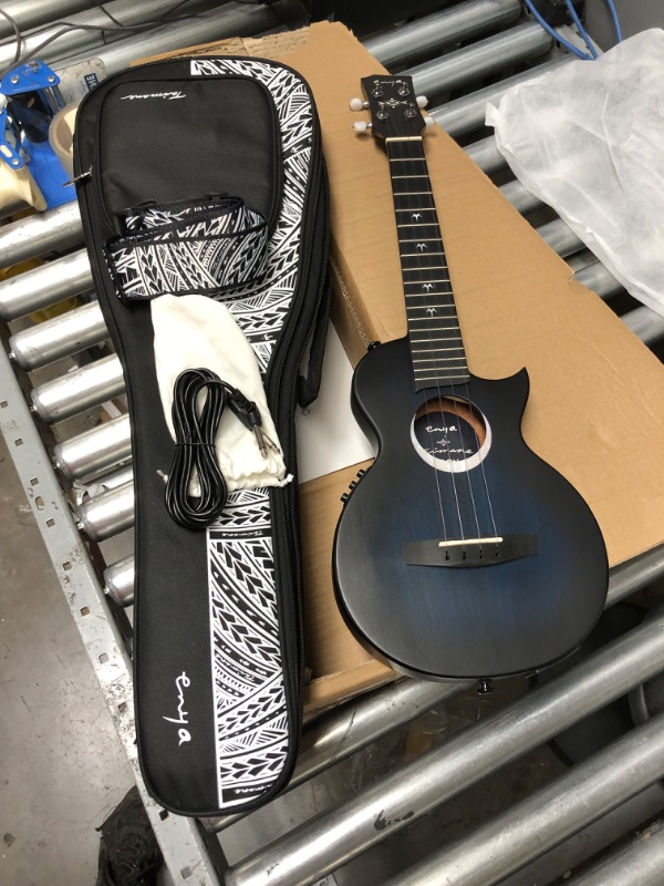 Photo 2 of LIKE NEW Enya Taimane Moon Signature Tenor Ukulele All Solid Mahogany 26" Blue Ukelele with Built-in AcousticPlus Pickup Bundle with Gig Bag and Strap(EUT-Moon BU EQ)
