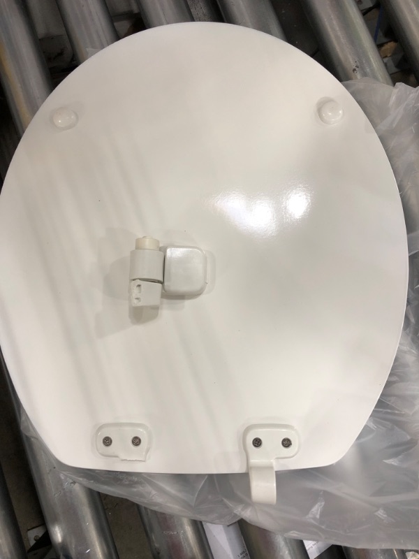 Photo 4 of **BROKEN, PARTS ONLY**
KOHLER Stonewood® Quiet-Close™ Round-front, Slow-Close, Wood, White toilet seat, K-20467-0, White White Round