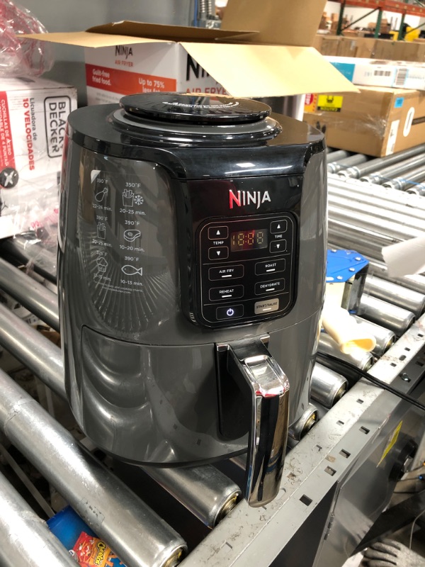 Photo 2 of ***USED***
Ninja AF101 Air Fryer that Crisps, Roasts, Reheats, & Dehydrates, for Quick, Easy Meals, 4 Quart Capacity, & High Gloss Finish, Black/Grey 4 Quarts